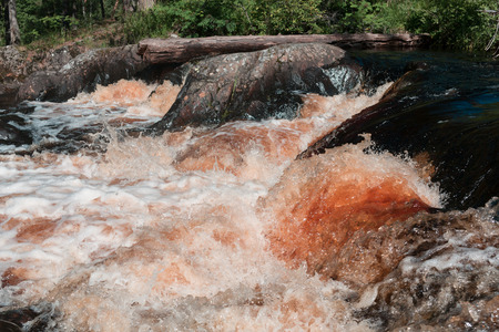 River flowing over rocks in forest. Weekend photo.の写真素材