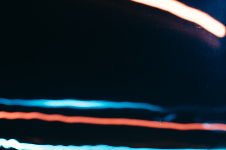 Abstract lines of light in the darkness. Photo with a long exposureの写真素材