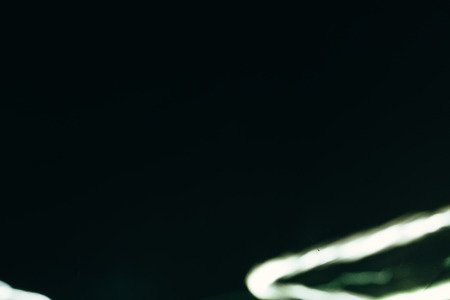 Abstract lines of light in the darkness. Photo with a long exposure
