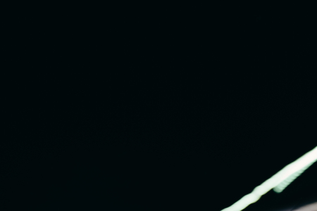 Abstract lines of light in the darkness. Photo with a long exposureの写真素材