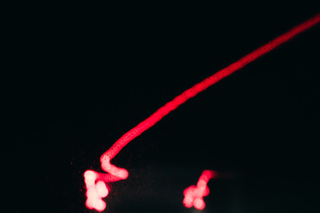 Abstract lines of light in the darkness. Photo with a long exposureの写真素材