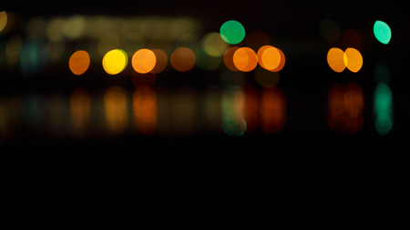 Beautiful night bokeh. Colorful abstract bokeh on a dark background. highlights the city at night...