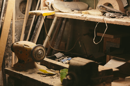 work bench with an electric emery night. empty workplacesの写真素材