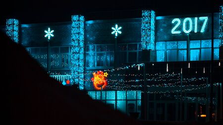 Christmas illumination on a building facade at night