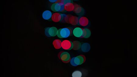 Multicolored abstract bokeh. Abstract Christmas vibrant backgroundの写真素材
