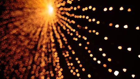 Bright yellow gold bokeh. Abstract Christmas vibrant backgroundの写真素材