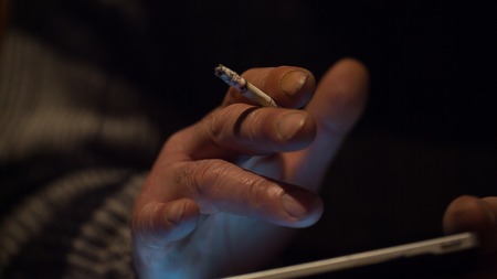 Tablet computer in the hands of an elderly man close upの写真素材