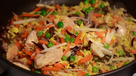 chicken vegetables rice and peas tasty dish closeupの写真素材