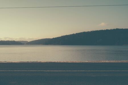 desert road near the lake. Traveller roadの写真素材