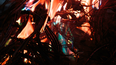 wires on fire. Firing winding insulation of electrical wiring in the fire close-up