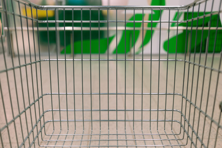 view from the shopping cart. product in the supermarket trolleyの写真素材