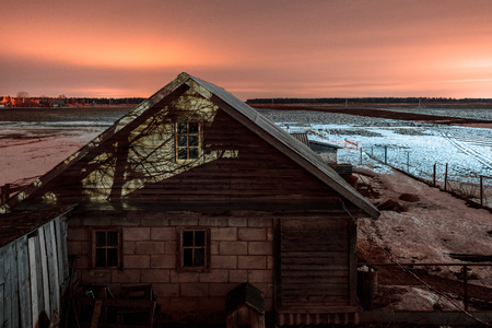 barn at sunset the view from the topの写真素材