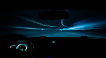 car drives a photograph on the road with a delay inside view