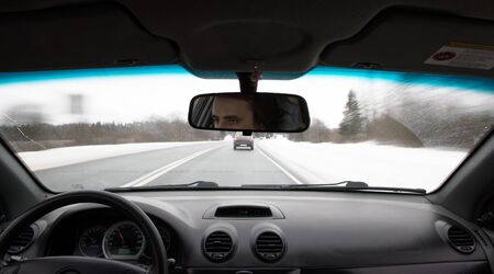 car drives on the road during the daytime inside viewの写真素材