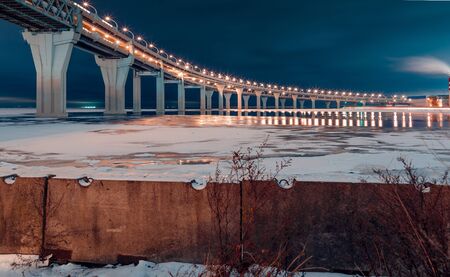 Western high speed diameter on Kanonersky Island in Saint Petersburg in the winter in the eveningの写真素材