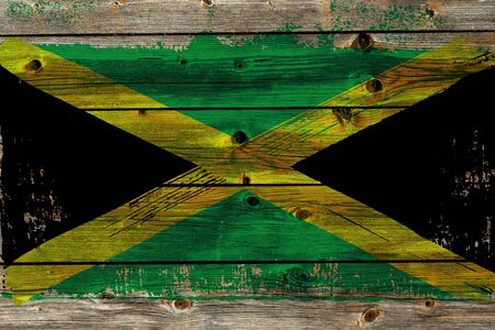 background from old Jamaican flag in grunge styleの写真素材