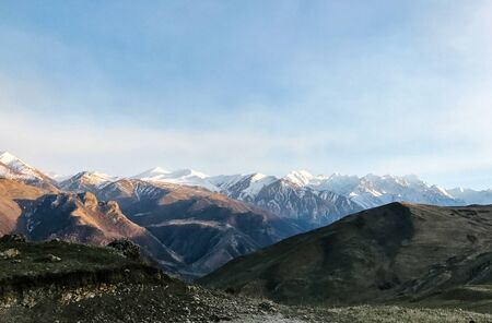 stone hills and mountains against the sky