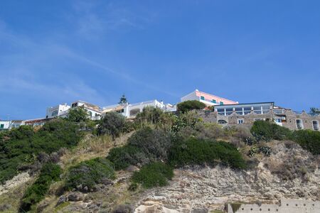 houses on the hills in Ischia Italy in the daytimeの写真素材