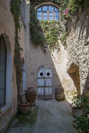 architecture and old buildings of Italy in the city of Ischia in the daytimeの写真素材