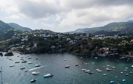 sea and coast as well as yachts and boats in Ischia Italyの写真素材