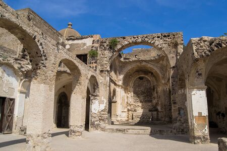 architecture and old buildings of Italy in the city of Ischia in the daytimeの写真素材
