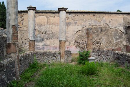 architecture and old buildings of Italy in the city of Ischia in the daytimeの写真素材
