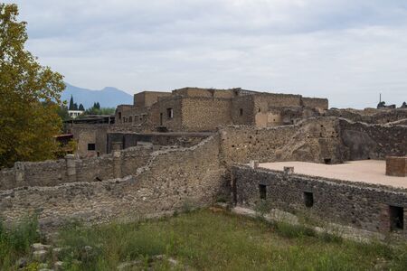 architecture and old buildings of Italy in the city of Ischia in the daytimeの写真素材