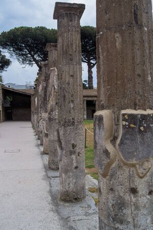 architecture and old buildings of Italy in the city of Ischia in the daytimeの写真素材