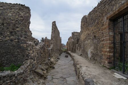 architecture and old buildings of Italy in the city of Ischia in the daytimeの写真素材