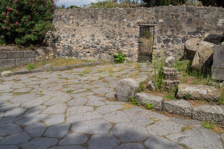 architecture and old buildings of Italy in the city of Ischia in the daytimeの写真素材