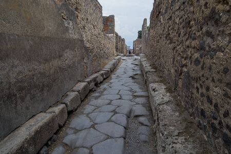 architecture and old buildings of Italy in the city of Ischia in the daytimeの写真素材
