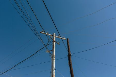 electric guiding support against the blue skyの写真素材