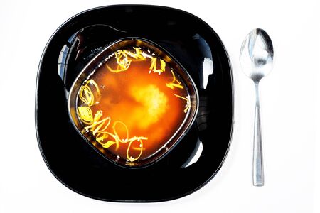 Japanese miso soup in a black plateの写真素材