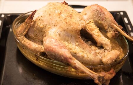 baked turkey on a trayの写真素材