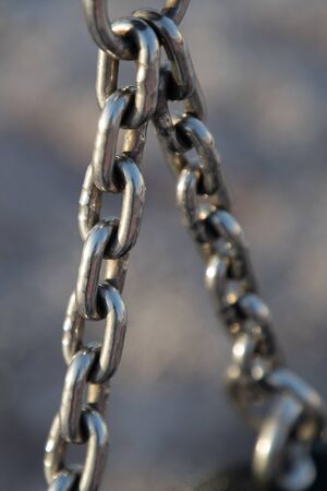 chain on the swing close-upの写真素材