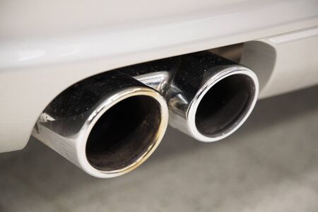 chrome double car silencer close-upの写真素材