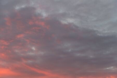 bright colored sunset sky closeupの写真素材