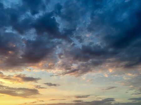 unusually beautiful sky with clouds at sunsetの写真素材