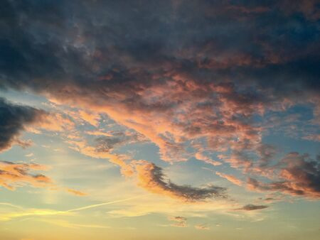 unusually beautiful sky with clouds at sunsetの写真素材