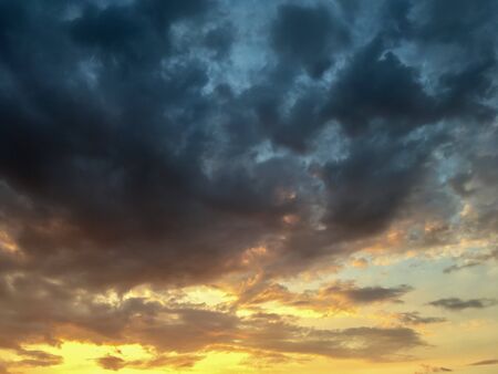 unusually beautiful sky with clouds at sunsetの写真素材