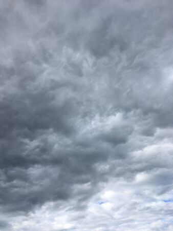 wicked stormy sky with gray cloudsの写真素材