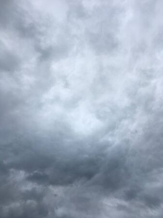 wicked stormy sky with gray cloudsの写真素材