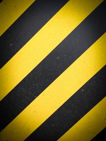 yellow black striped hazard warning backgroundの写真素材