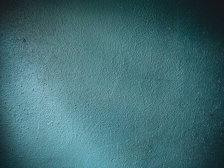 old rough dark blue-green wall backgroundの写真素材