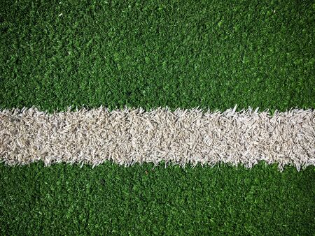 football field with artificial grass lawn closeup top view