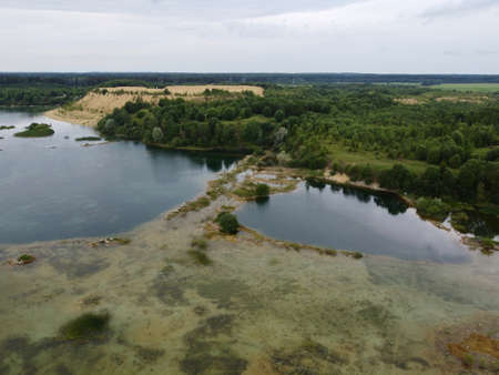 Old flooded sand pit aerial photoの写真素材