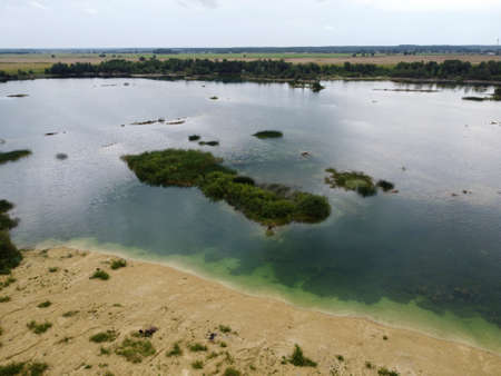 Old flooded sand pit aerial photoの写真素材