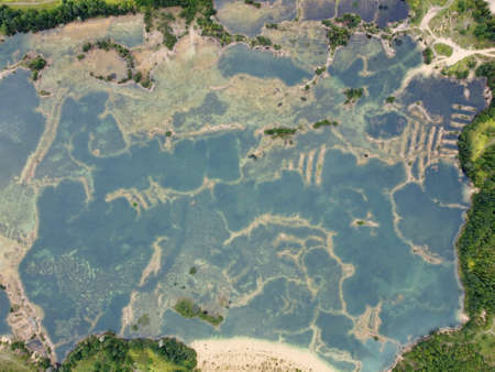 Old flooded sand pit aerial photoの写真素材