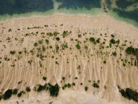 Old flooded sand pit aerial photoの写真素材