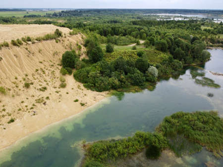 Old flooded sand pit aerial photoの写真素材